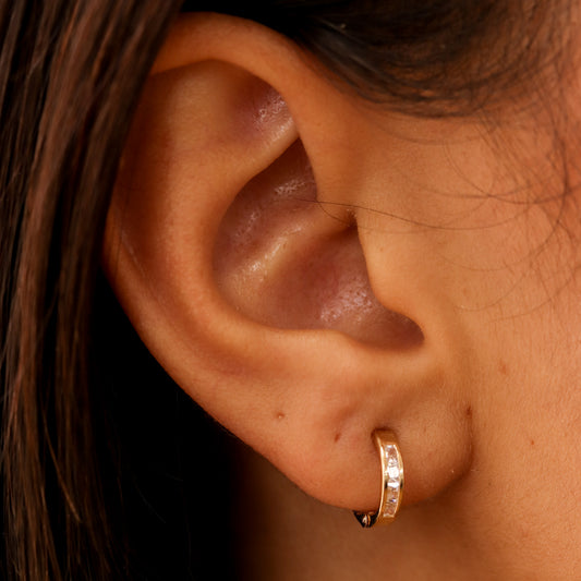 White and Gold Huggie Earrings