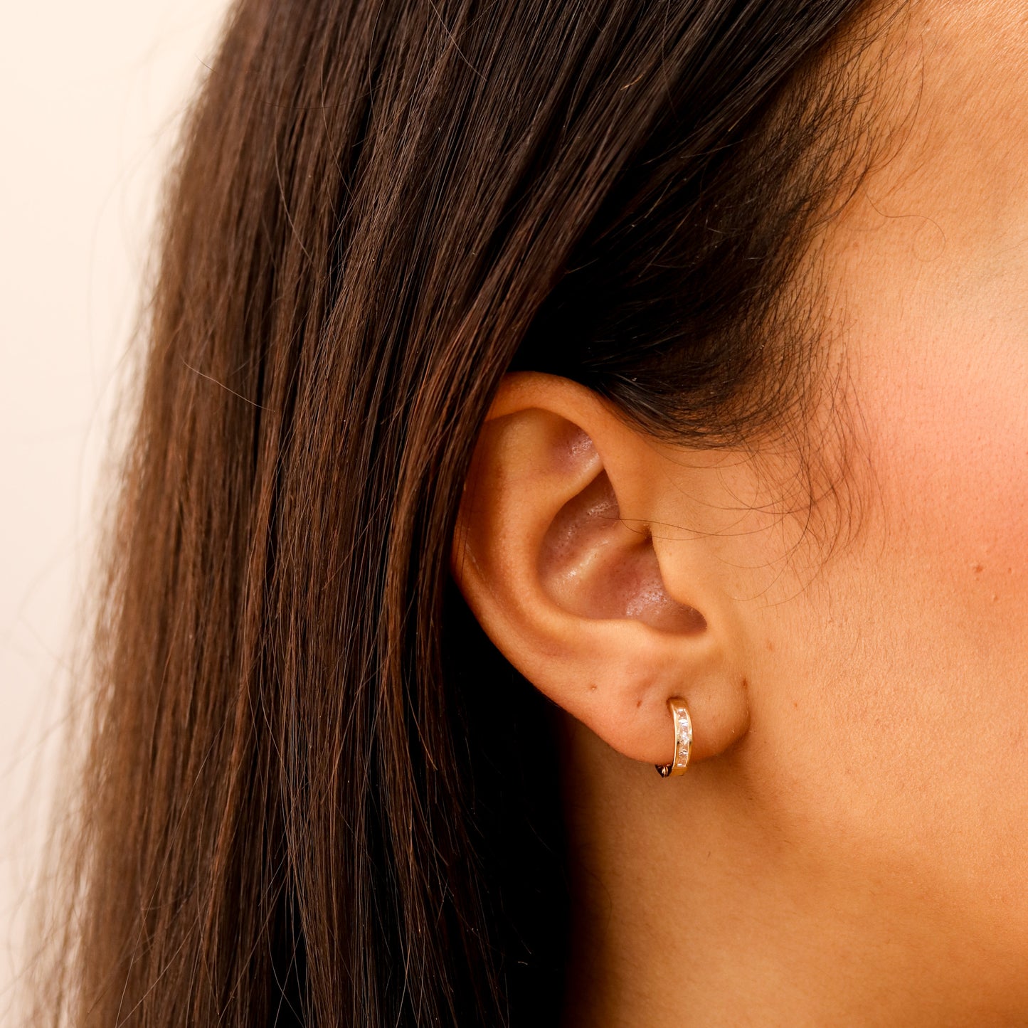 White and Gold Huggie Earrings