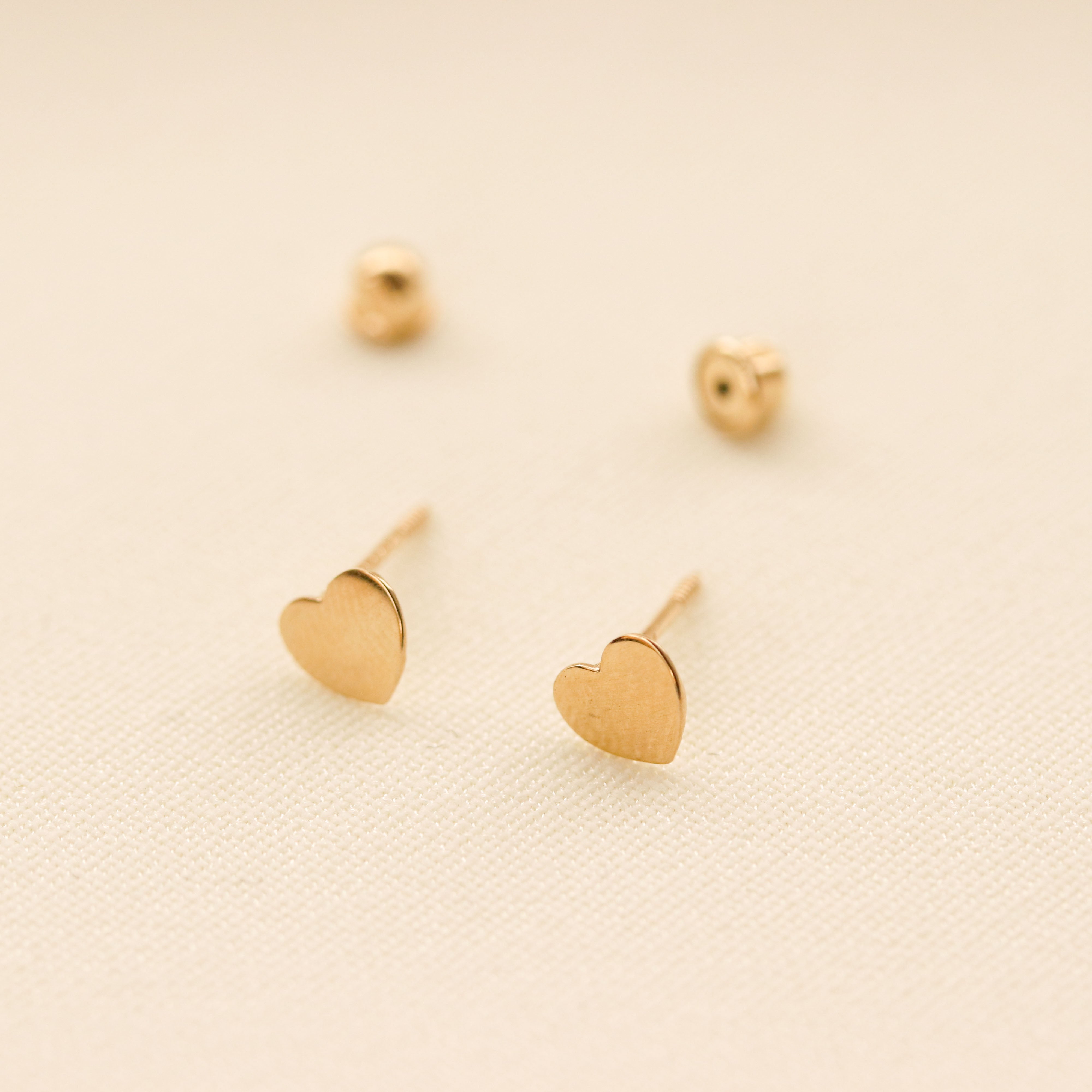 Elevated Heart Stud Earrings | Gold | Pandora US